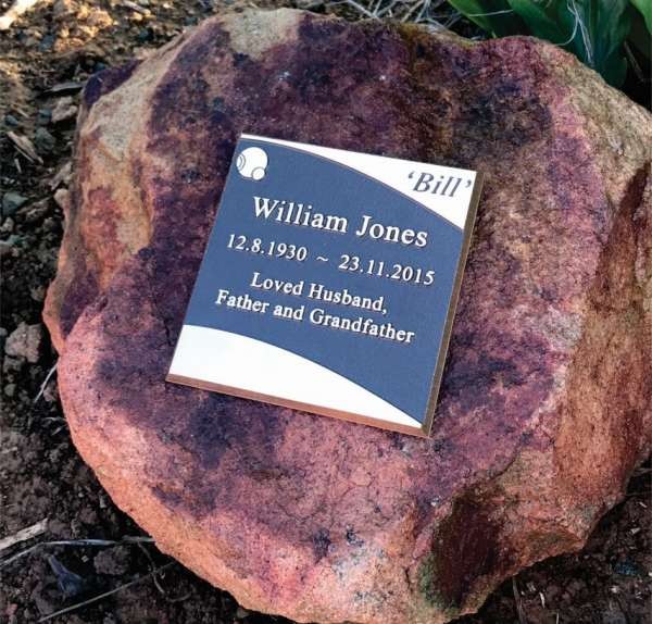 Plaque on rock display
