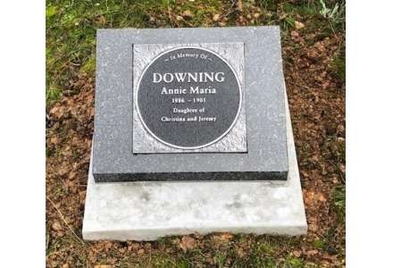 Ashes plaque on sloper and concrete pad