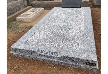 MCBEATH-opal white low ashlar and kerbs-chamfered surname